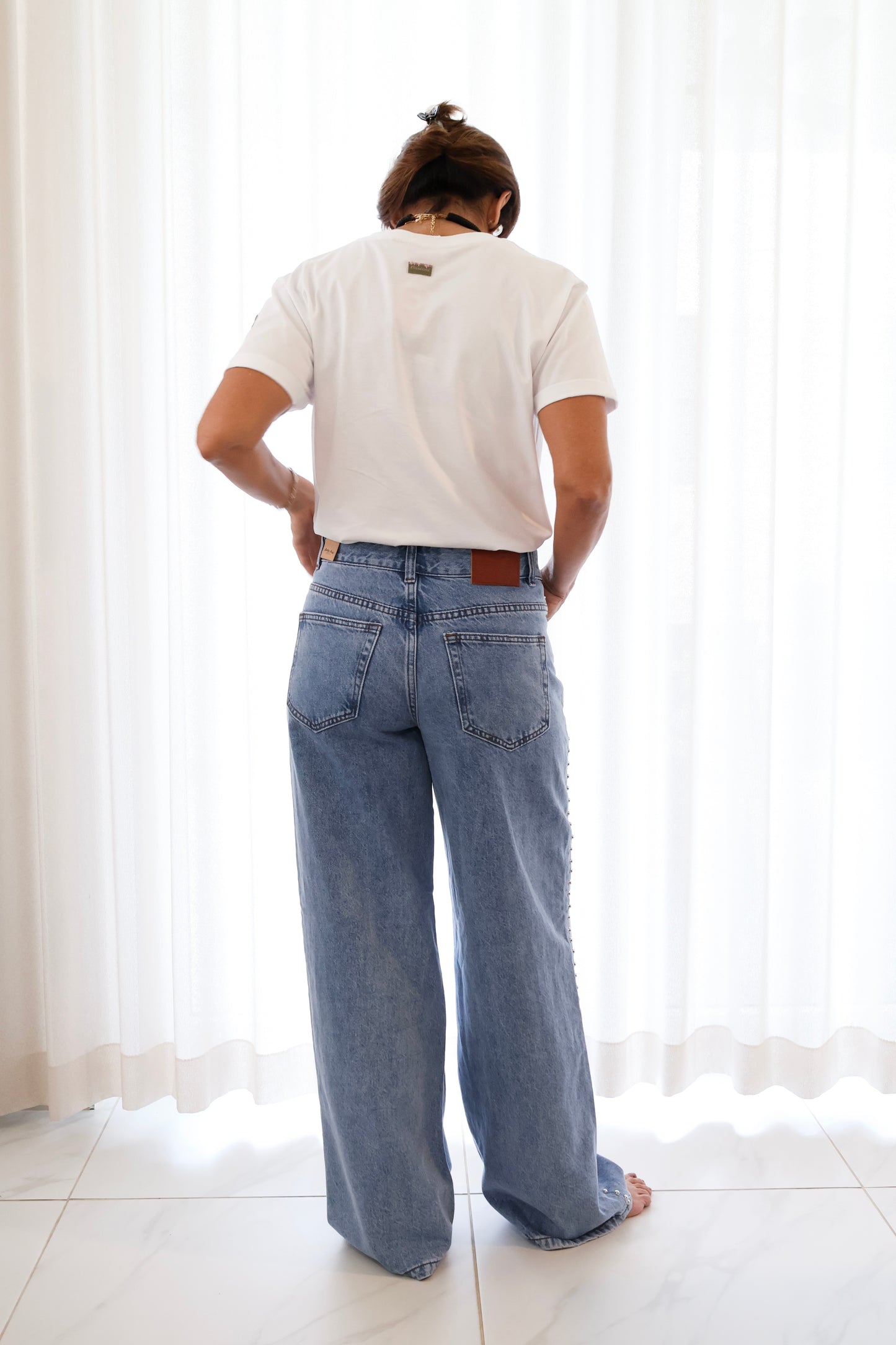 STUDDED DENIM